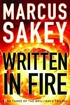 Written in Fire | Sakey, Marcus | Signed First Edition Trade Paper Book